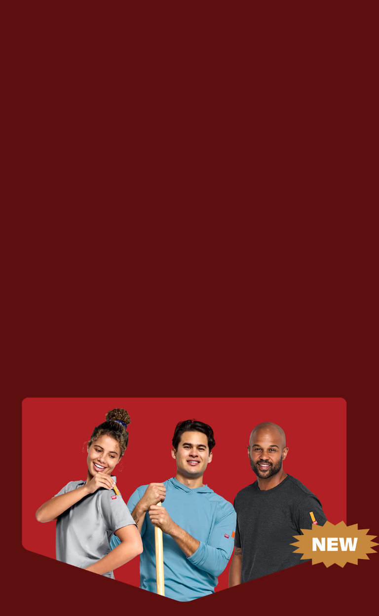 Three workers standing together wearing new Red Kap B2B workwear
