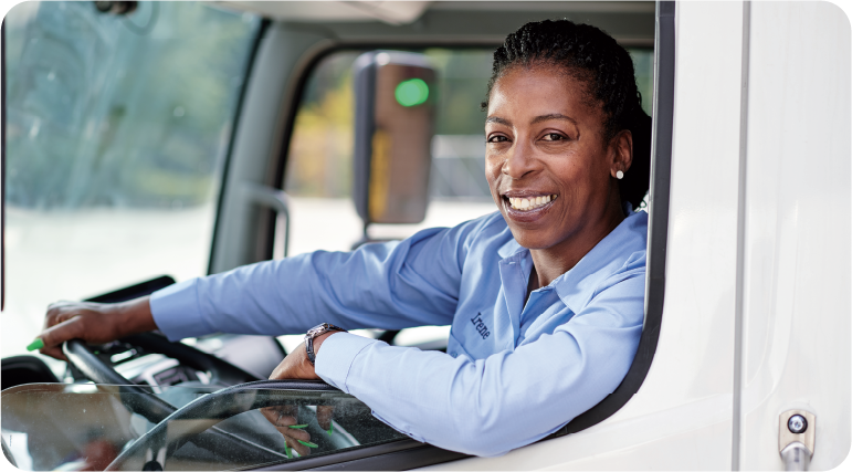 a woman inside the driver side of her truck a woman inside the driver side of her truck