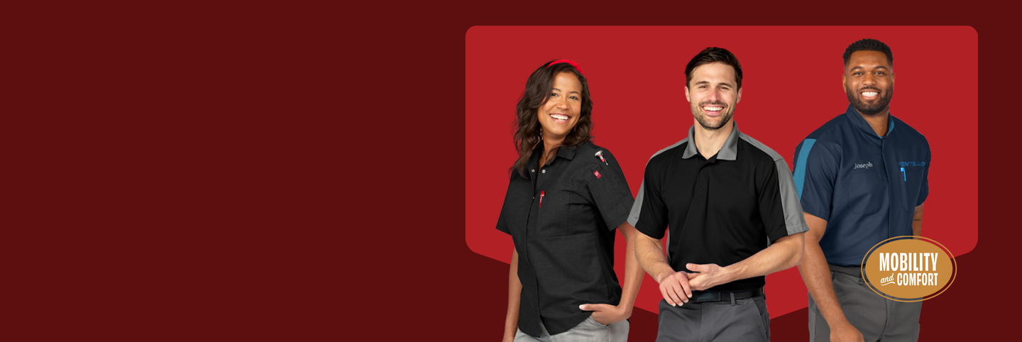 Three workers standing together wearing new Red Kap B2B workwear